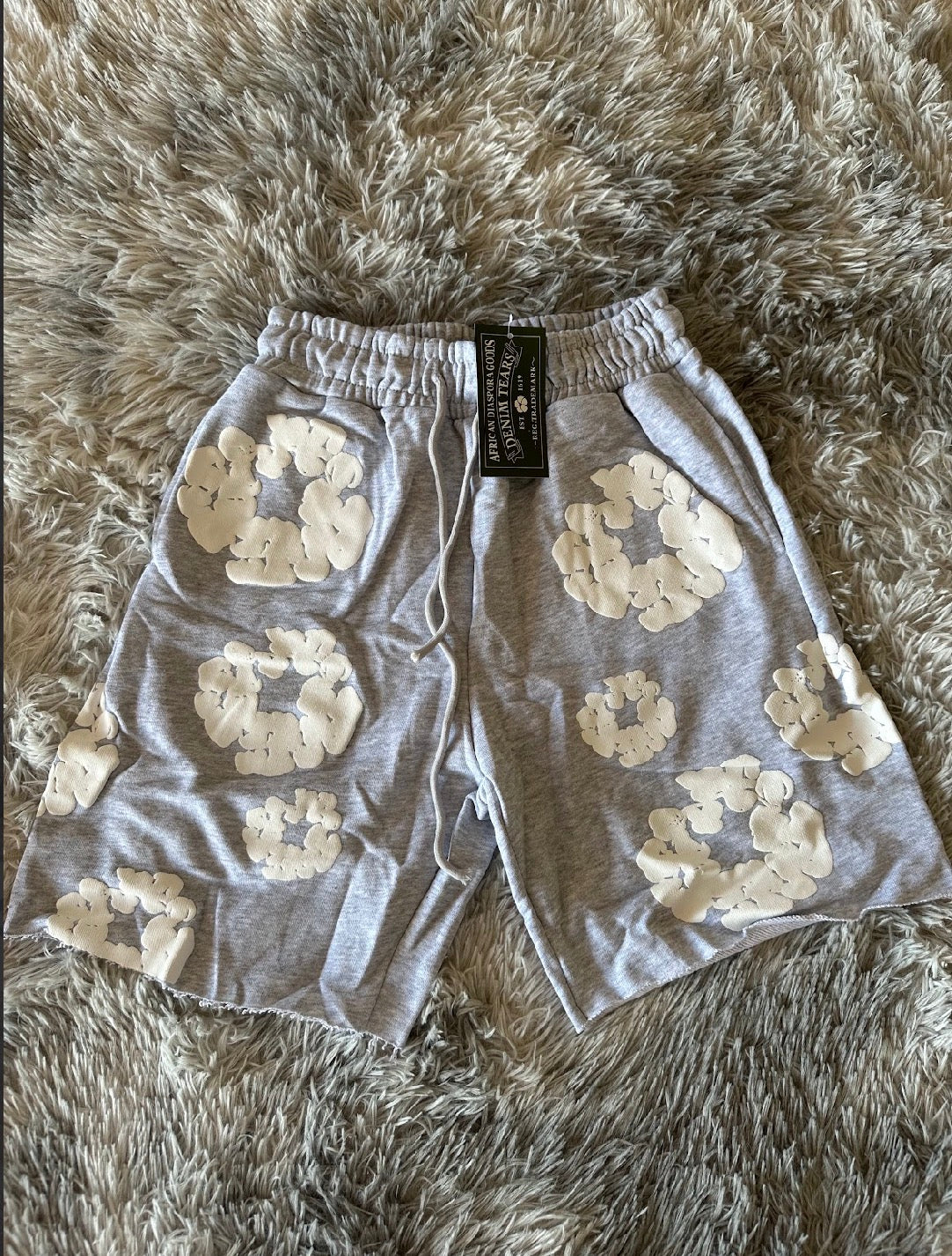 Pantalón corto DENIM TEARS “Gris y Blanco”